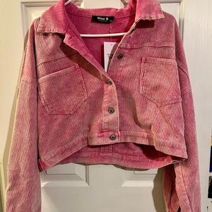 Hot pink bedazzled jacket.